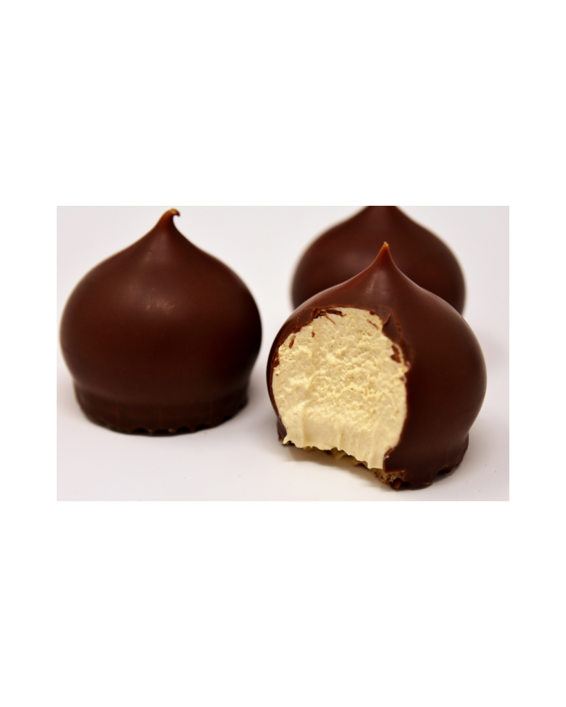 Three dark chocolate-dipped truffles with a soft cream centre, one bitten open to reveal the pillowy filling